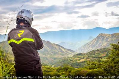 motorcyclist overlooking mountains in southern ecuador