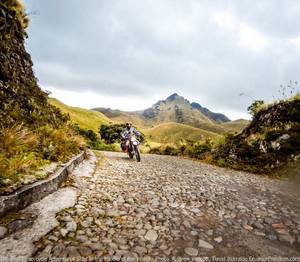 riding a dual sport motorcycle to laguna mojanda near otavalo ecuador
