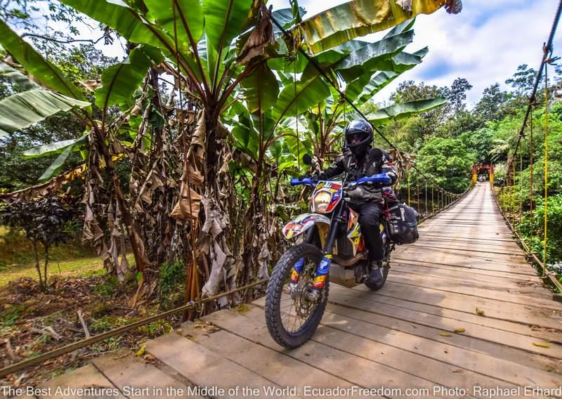 wire suspension bridge in ecuador KTM 690 on dual sport motorcyle adventure tour