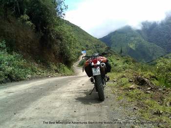 motorcycle on dirt road to mindo ecuador
