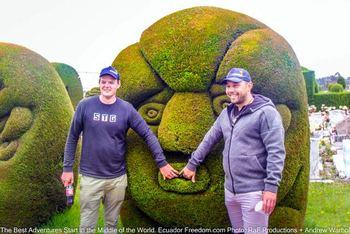two motorcyclists visiting the topiary cemetary in tulcan ecuador